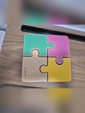 Lovevery Chunky Wooden Jigsaw Puzzle featuring reversible pastelpieces.
